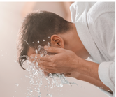 A man washing his face