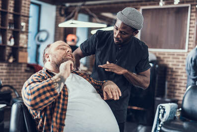 barber consulting with client
